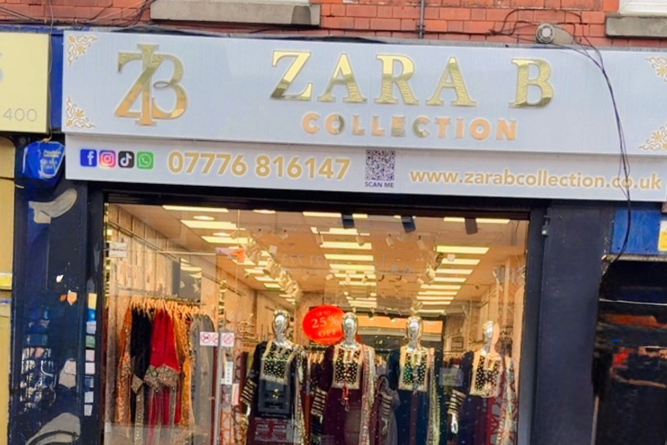Zara B Collection store front with mannequins and clothing displayed